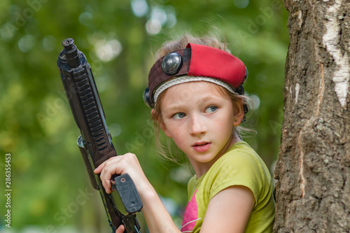 Girl with a weapon for the game laser tag