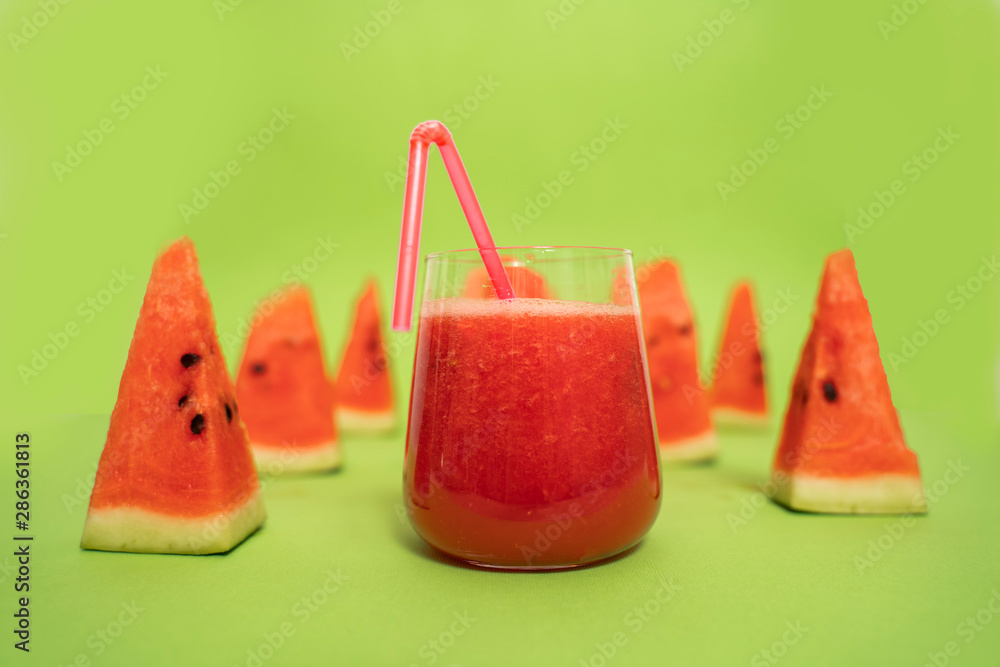 watermelon organic juice / smoothie peaces of fruit next to it watermelon organic juice / smoothie peaces of fruit next to it
