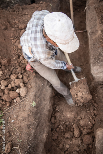 Detail of men working in construction