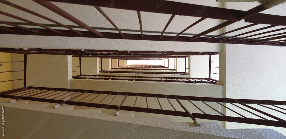 Obraz premium Stairs in a high-rise building. Concrete stairs. Steps in the entrance.