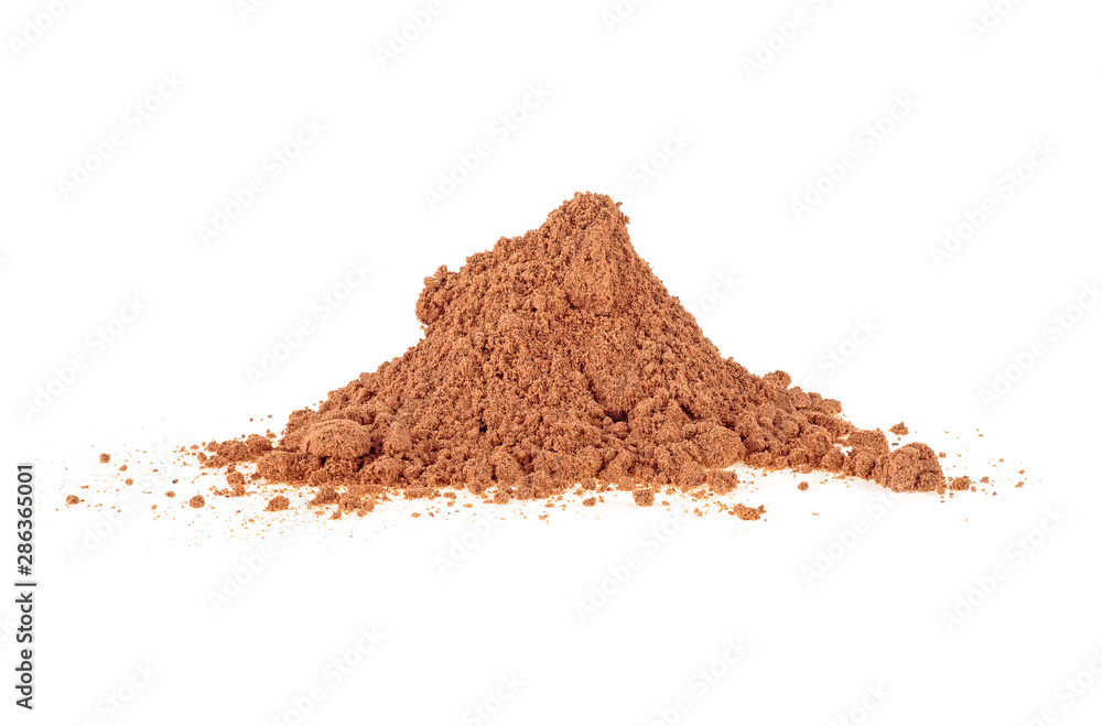 Pile of cinnamon powder isolated on a white background Pile of cinnamon powder isolated on a white background