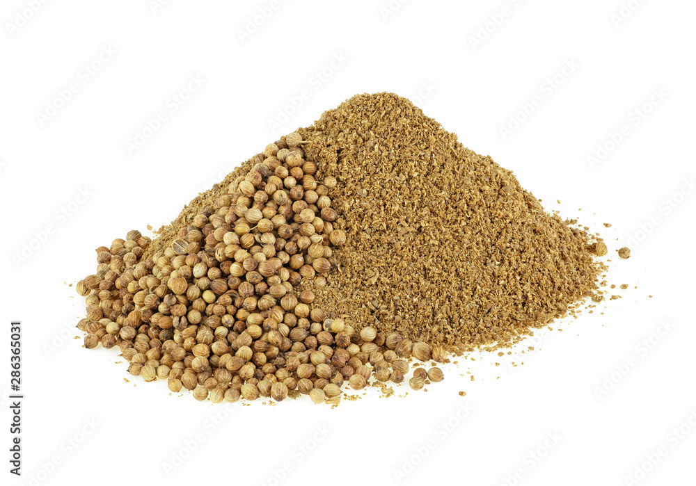 Pile of coriander powder with seeds isolated on a white background Pile of coriander powder with seeds isolated on a white background