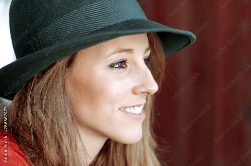 Blond girl photographed in an old building with white walls and natural poses. Blond girl photographed in an old building with white walls and natural poses.