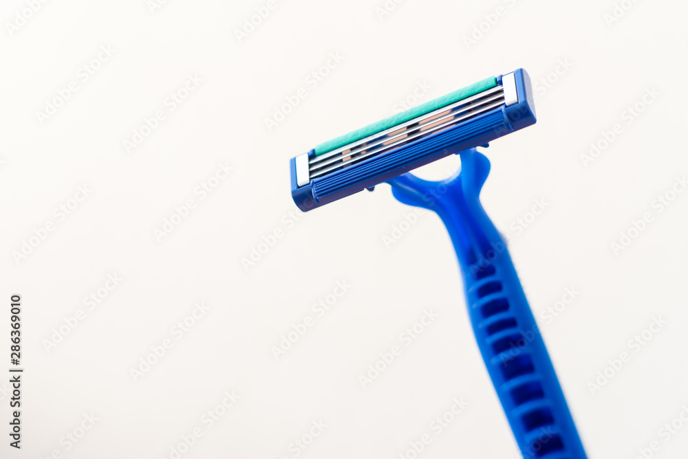 New disposable razor blade, on white background, isolated New disposable razor blade, on white background, isolated