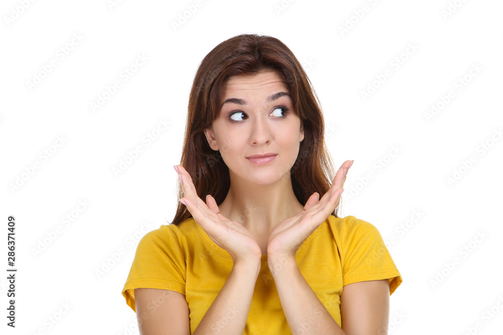 Young woman in yellow t-shirt on white background Young woman in yellow t-shirt on white background