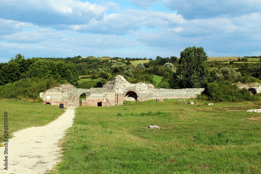 Felix Romuliana roman empire palace ruins surrounded by grass (Gamzigrad - Serbia)