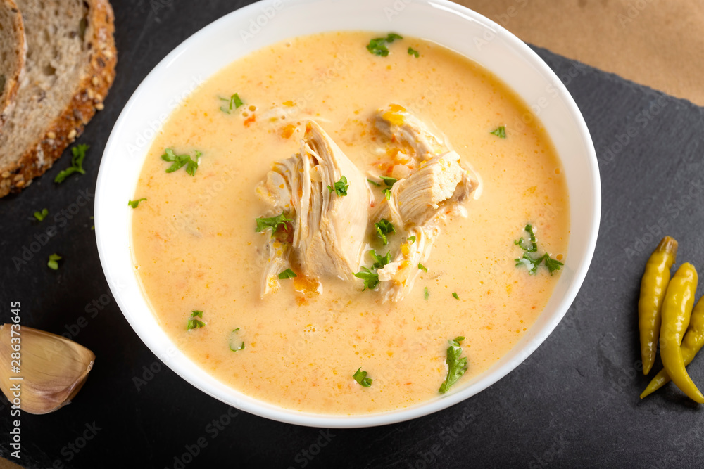 Ciorba radauteana - Romanian traditional chicken soup with cream Ciorba radauteana - Romanian traditional chicken soup with cream