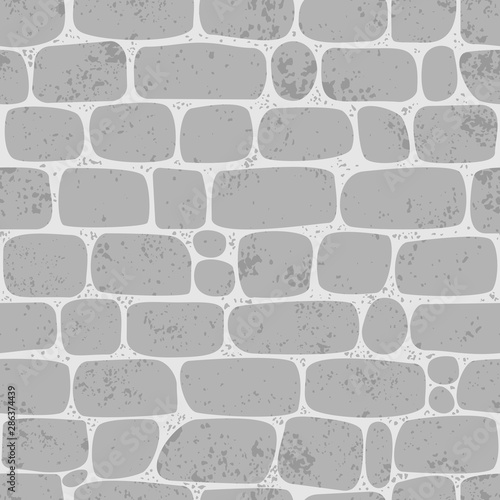 Seamless pattern. Wall of gray jagged stones. Texture for print, wallpaper, home decor, textile, package design, invitation or website background.