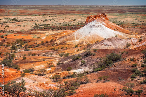 South Australia – Outback desert with colored hills under clear sky as panorama