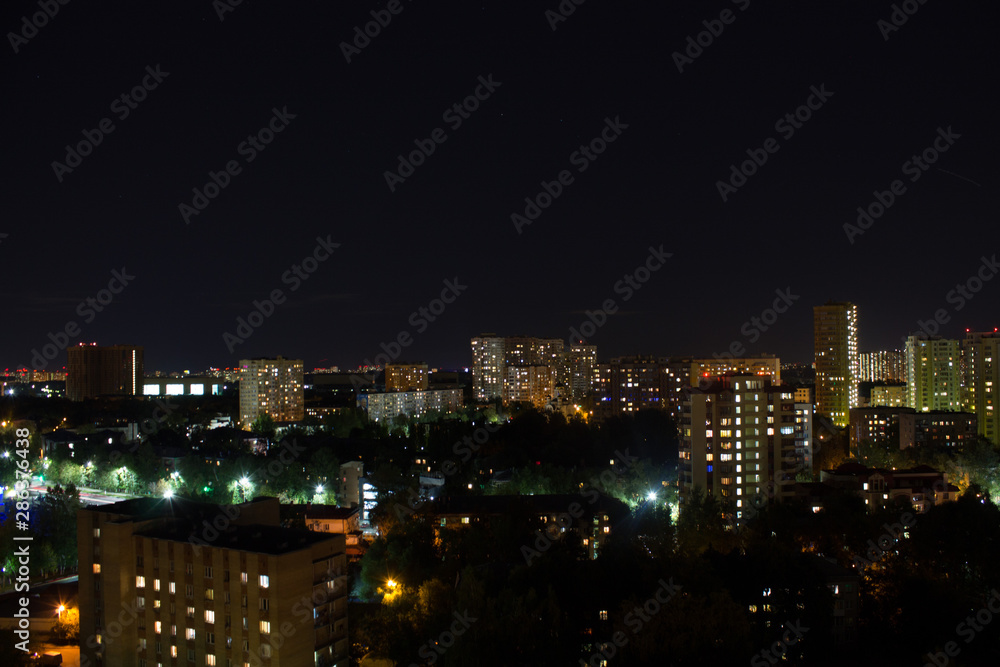 panorama of the night city with modern residential buildings in Moscow Russia