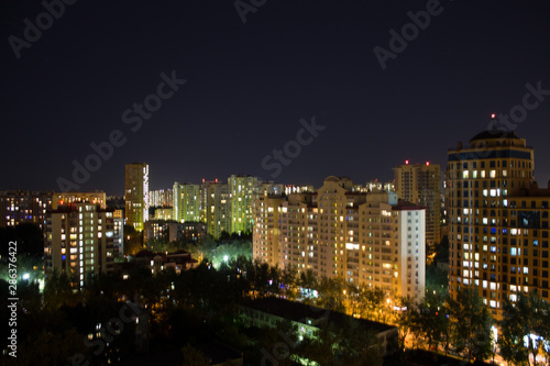 panorama of the night city with modern residential buildings in Moscow Russia © Inna