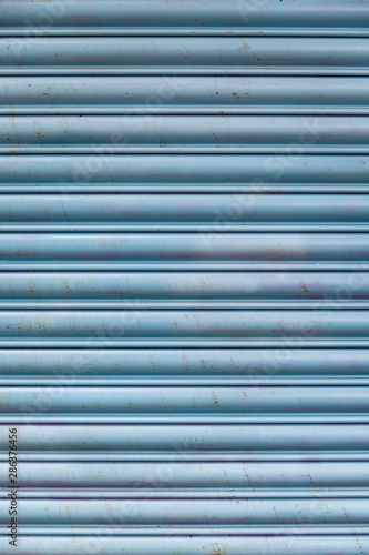Background: Baby Blue metal background with rust spots