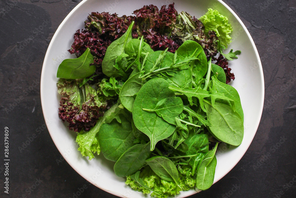 Healthy salad, leaves mix salad (mix micro greens, juicy snack). food background - Image. copy space Healthy salad, leaves mix salad (mix micro greens, juicy snack). food background - Image. copy space