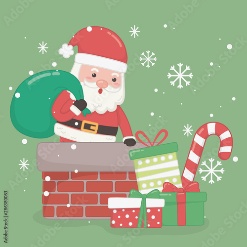 christmas card with santa claus and bag in chimney