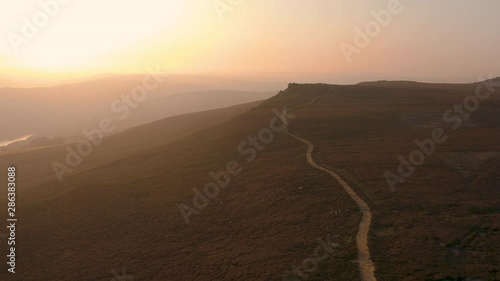 Aerial footage from the beautiful Derwent Edge during a stunning hazy sunset in the Peak District National Park