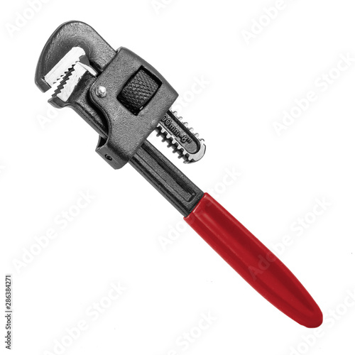 red pipe adjustable metal wrench isolated on white background