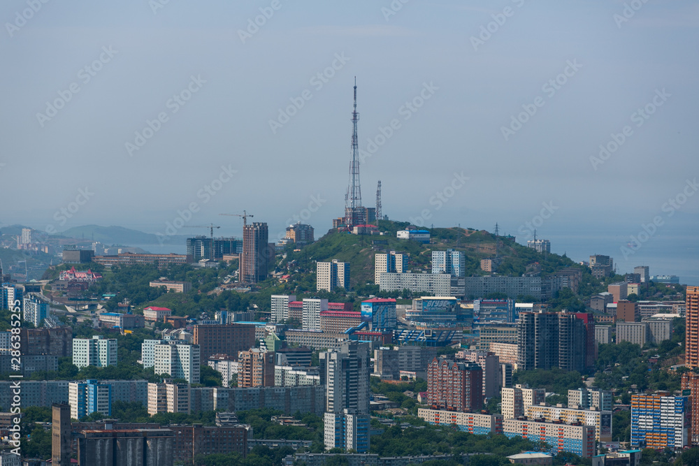 Aerial view of the central part of Vladivostok. The sleeping areas of the big city.