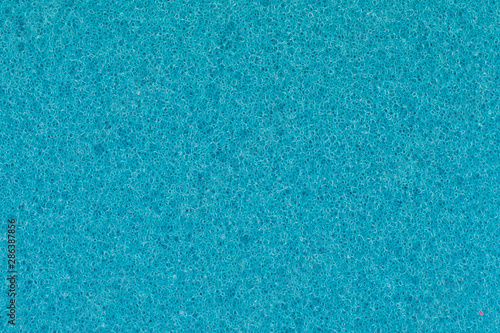 Blue cleaning kitchen sponge macro isolated