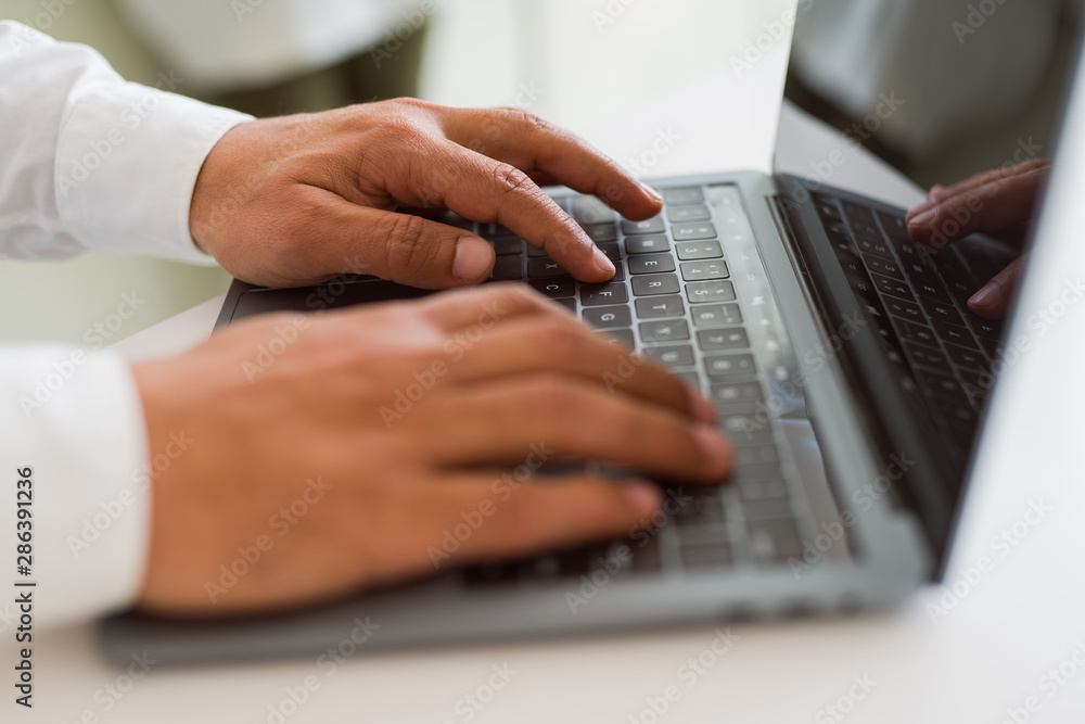 Close up of business man working using computer laptop Close up of business man working using computer laptop