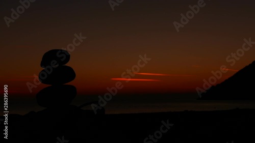 Scenic sunrise sun rising over sea surface, Greece Peloponnese Lakonia, Vlychada Beach, Richea. Timelapse 4K ProRes HQ codec photo