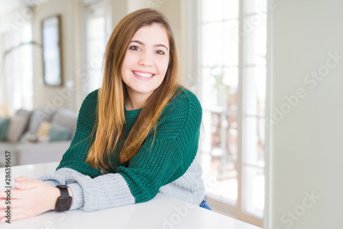 Beautiful young woman smiling confident to the camera Free Download Beautiful young woman smiling confident to the camera - GFXLoad