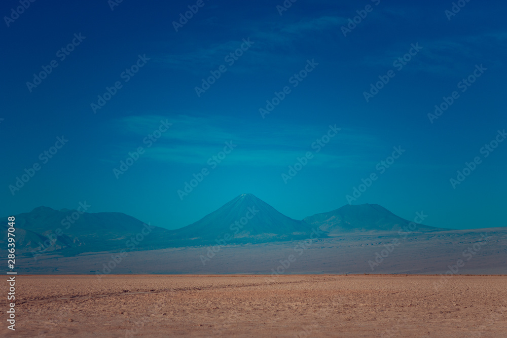 Mountains and a volcano in the Atacama desert