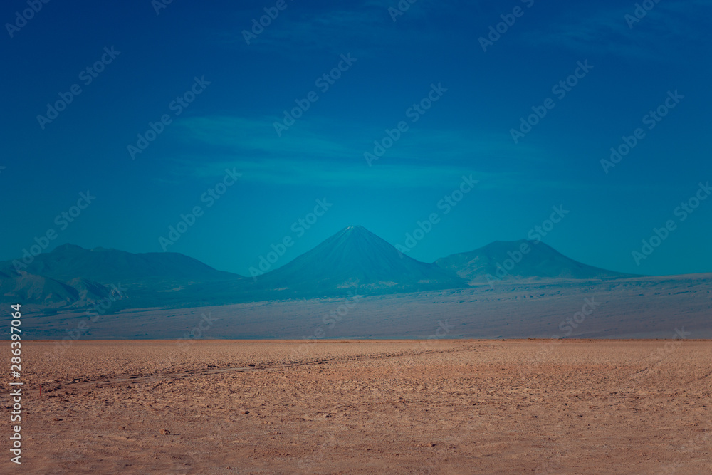 Mountains and a volcano in the Atacama desert