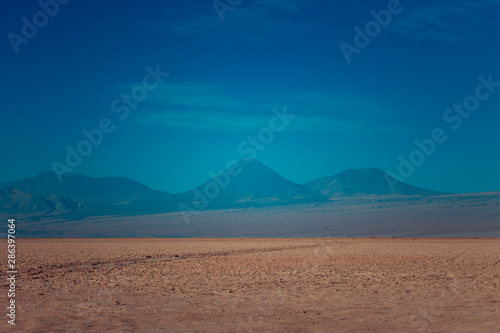 Mountains and a volcano in the Atacama desert