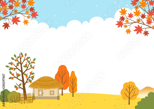 Autumn landscape with traditional thatched houses