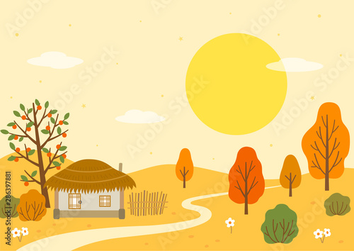 Autumn landscape with traditional thatched houses