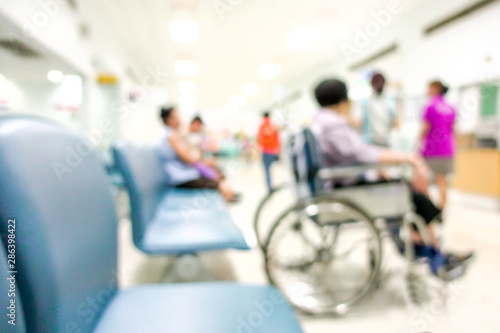 Blur of hospital hall patient go to see the doctor