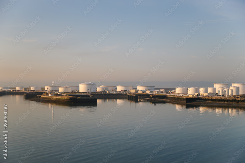 Fuel and oil storage tanks along the water at the port of Le Havre