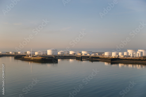 Fuel and oil storage tanks along the water at the port of Le Havre