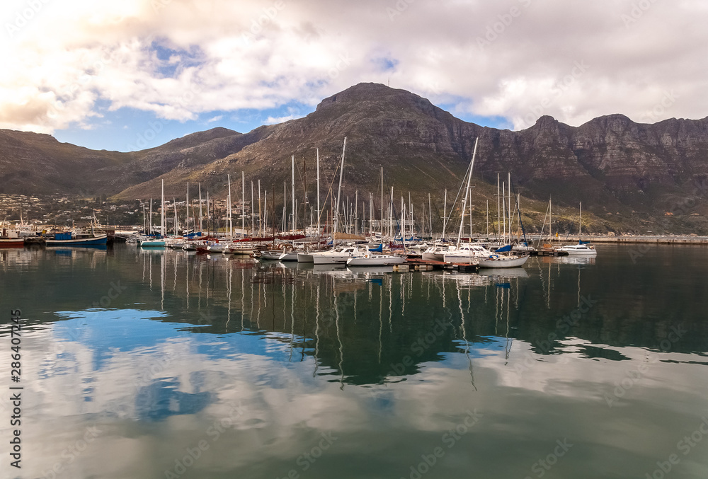 Sailboats moored  in Hout Bay, South Africa.