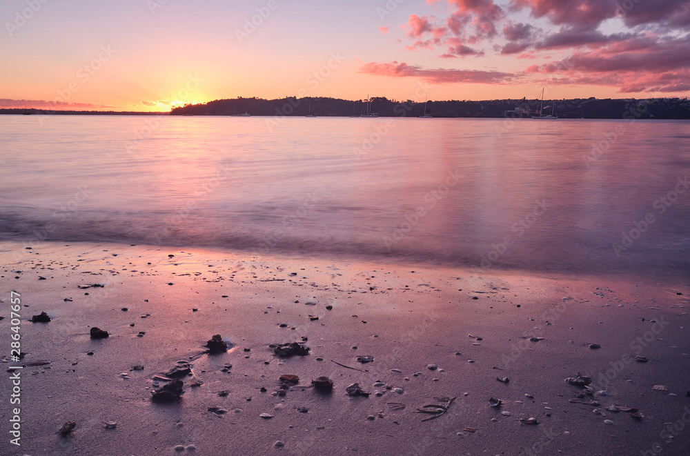 Sunset and Auckland Harbour in New Zealand winter June 2019