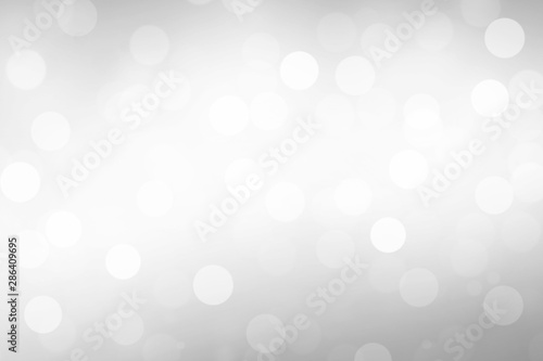 Glittering White Bokeh Lights Holiday Background