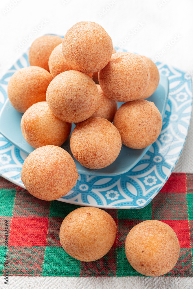 Fritters on the table, typical Colombian food, close-up image Fritters on the table, typical Colombian food, close-up image