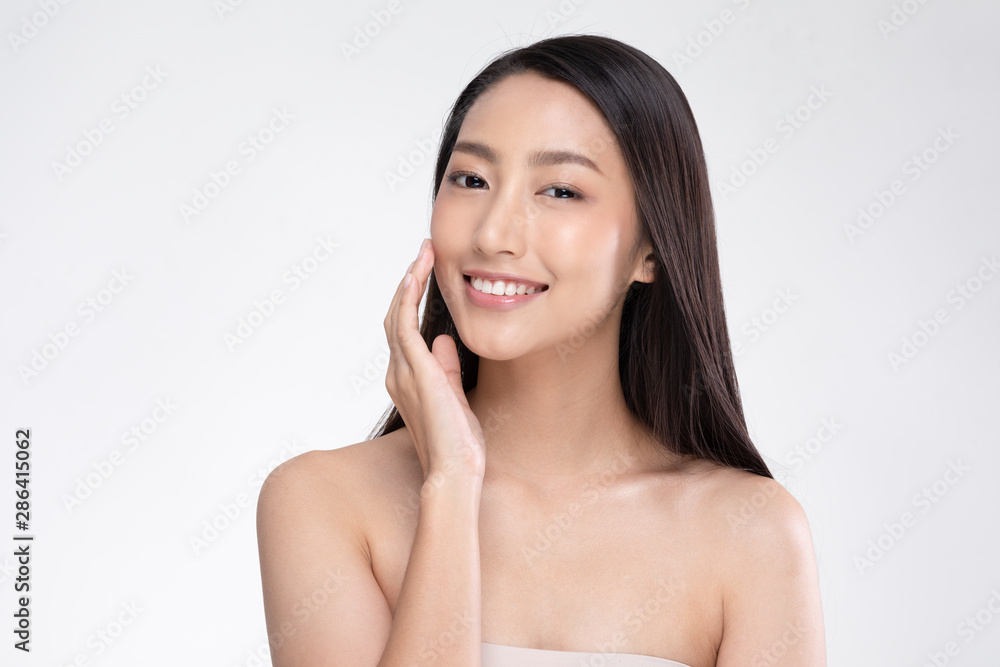 Beautiful Asian woman touching soft cheek smile with clean and fresh skin Happiness and cheerful with positive emotional,isolated on white background,Beauty and Cosmetics Concept Beautiful Asian woman touching soft cheek smile with clean and fresh skin Happiness and cheerful with positive emotional,isolated on white background,Beauty and Cosmetics Concept