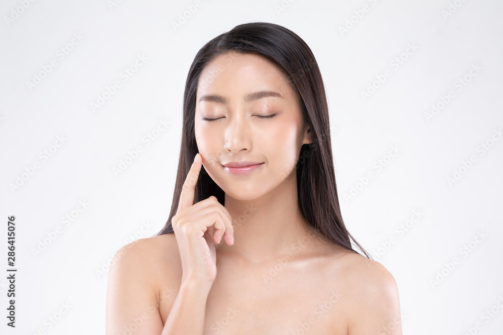 Beautiful Asian woman touching soft cheek smile with clean and fresh skin Happiness and cheerful with positive emotional,isolated on white background,Beauty and Cosmetics Concept Beautiful Asian woman touching soft cheek smile with clean and fresh skin Happiness and cheerful with positive emotional,isolated on white background,Beauty and Cosmetics Concept
