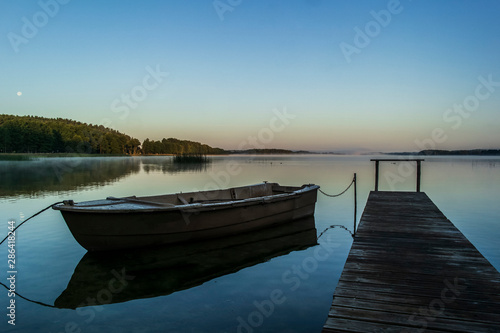 Morning and old wooden fishing boat. European travel © vytautas