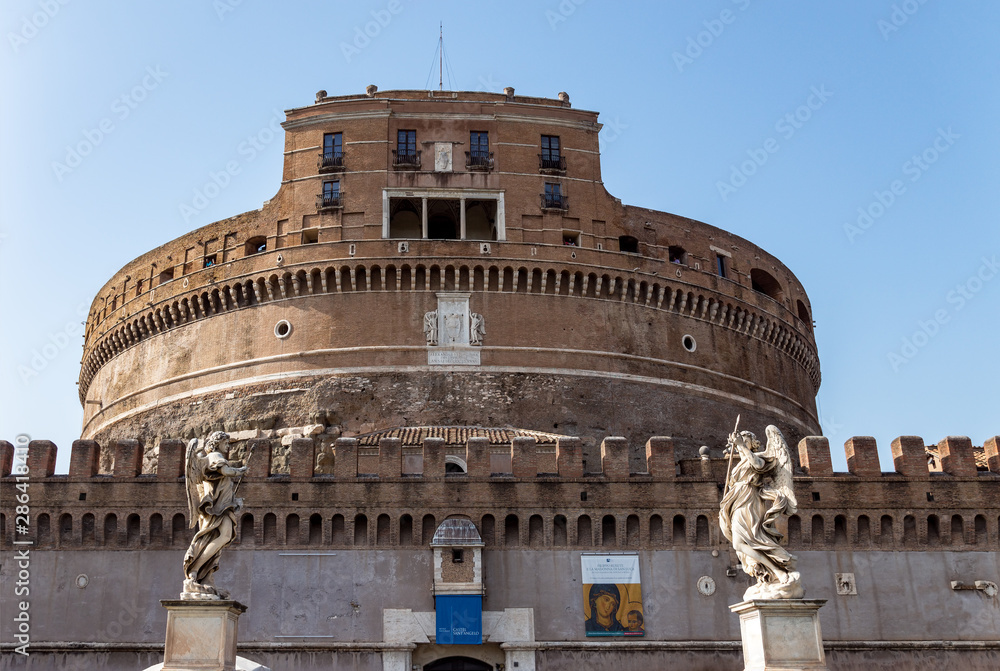 Castel Sant'Angelo and statues of angels on the Sant'Angelo bridge - Rome, Itlay