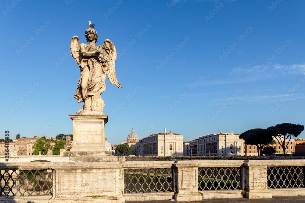 Angel with the Crown of Thorns at the Sant'Angelo bridge- Rome, Italy. Sculpture by Bernini, 1598-1680. Inscription is In my affliction, whilst the thorn is fastened upon me.