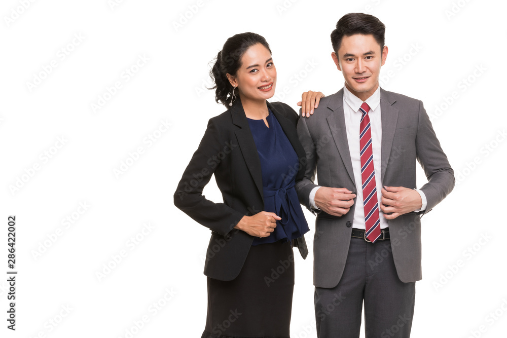 Two business people standing and posing.. Two business people standing and posing..