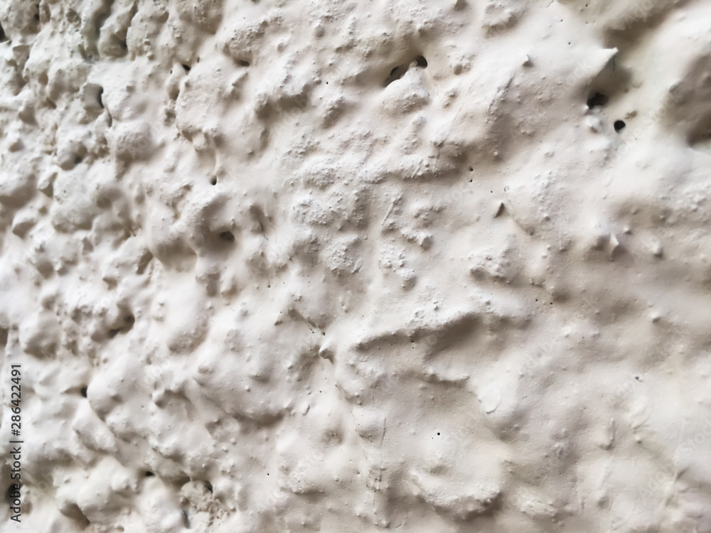 The texture of the white wall. Abstract white background. The texture of the white wall. Abstract white background.