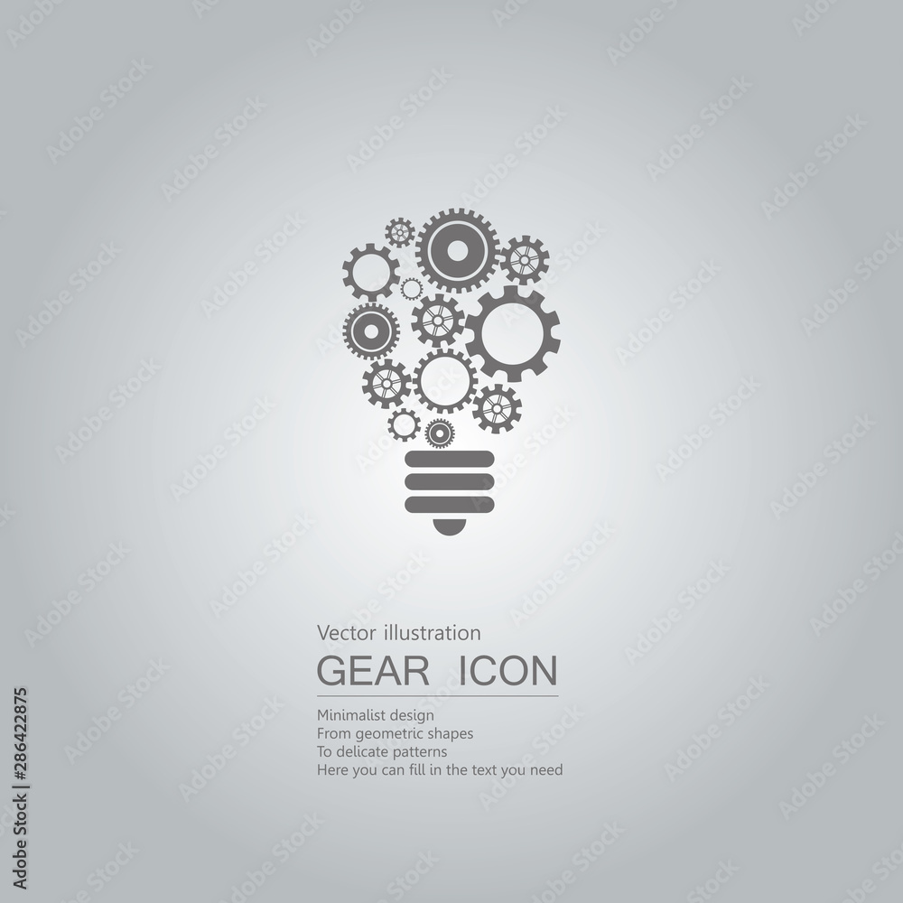 The idea of gears. The background is a gradient of gray. The idea of gears. The background is a gradient of gray.