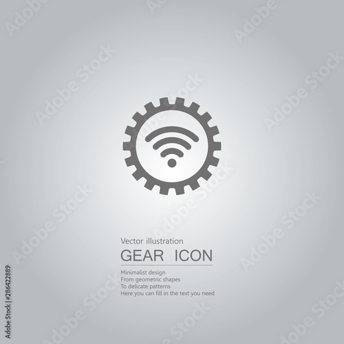 Gears and wireless technology.The background is a gradient of gray.	