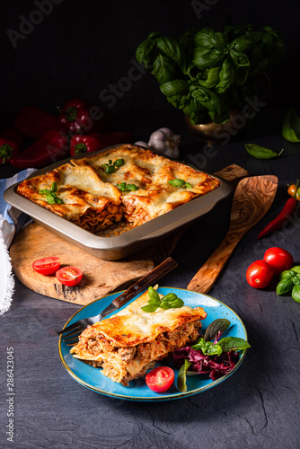 spicy lasagne with tomato sauce and basil