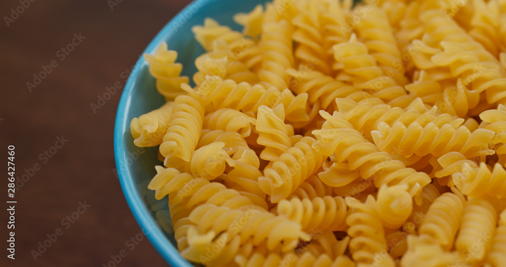 Stack of fusilli on plate Stack of fusilli on plate