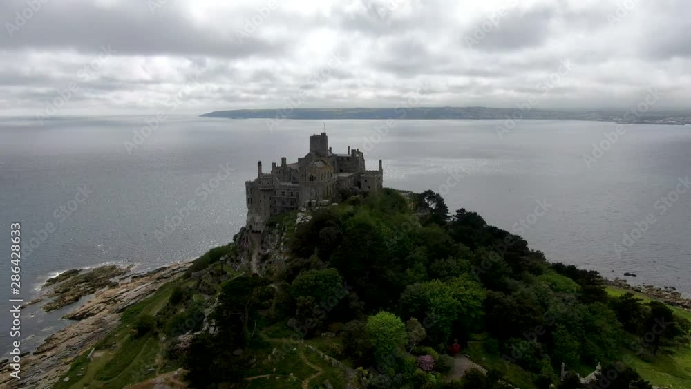 St Michael's Mount is a small tidal island in Mount's Bay, Cornwall, England, United Kingdom. Castle and chapel on the top of the mount St Michael's Mount is a small tidal island in Mount's Bay, Cornwall, England, United Kingdom. Castle and chapel on the top of the mount