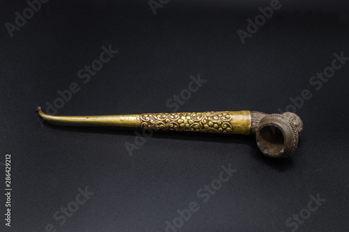 Canvastavla A hand-crafted ceramic smoking pipe with an engraved mouthpiece, Myanmar, circa